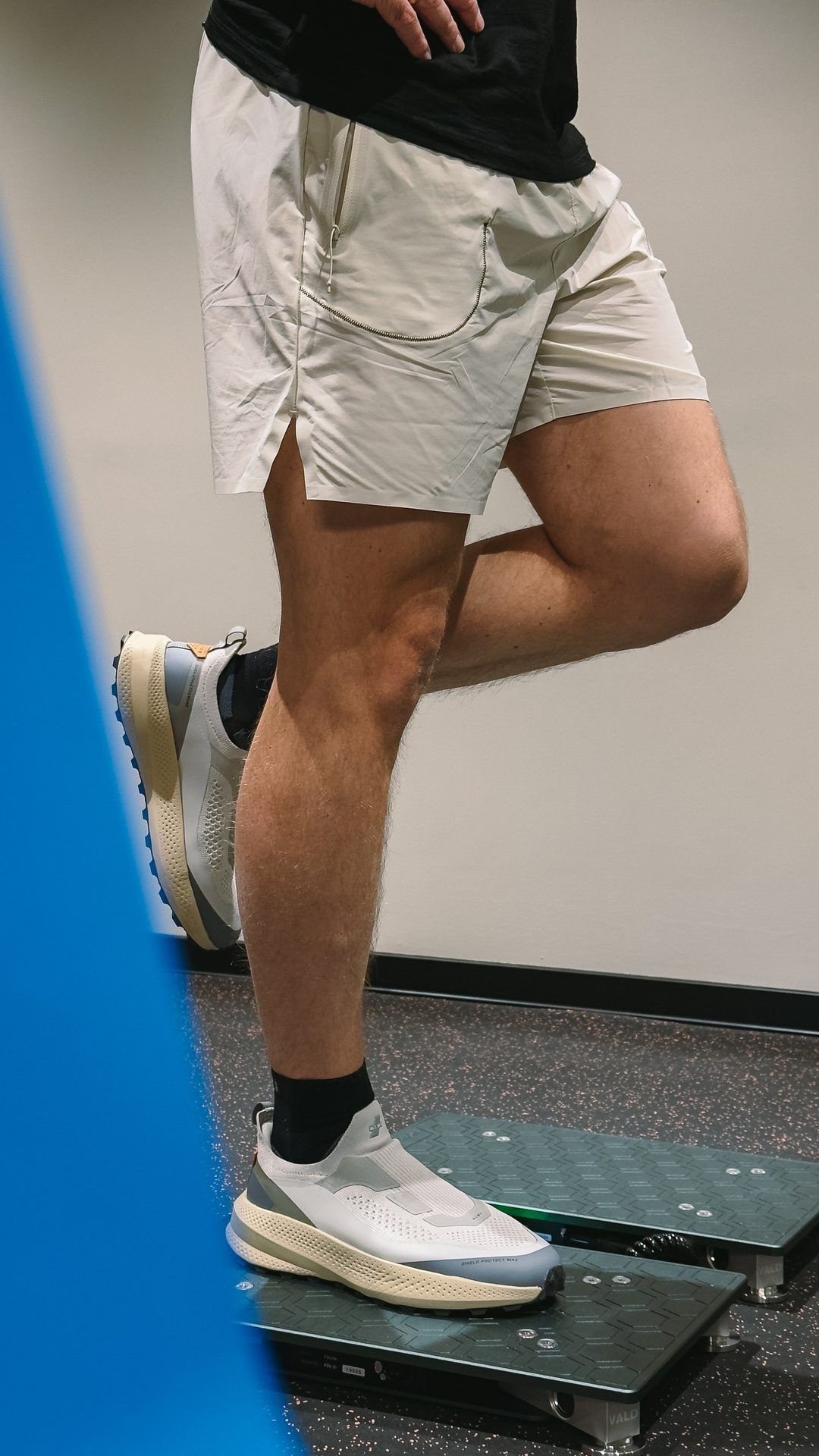 A person balancing on one leg on a force plate